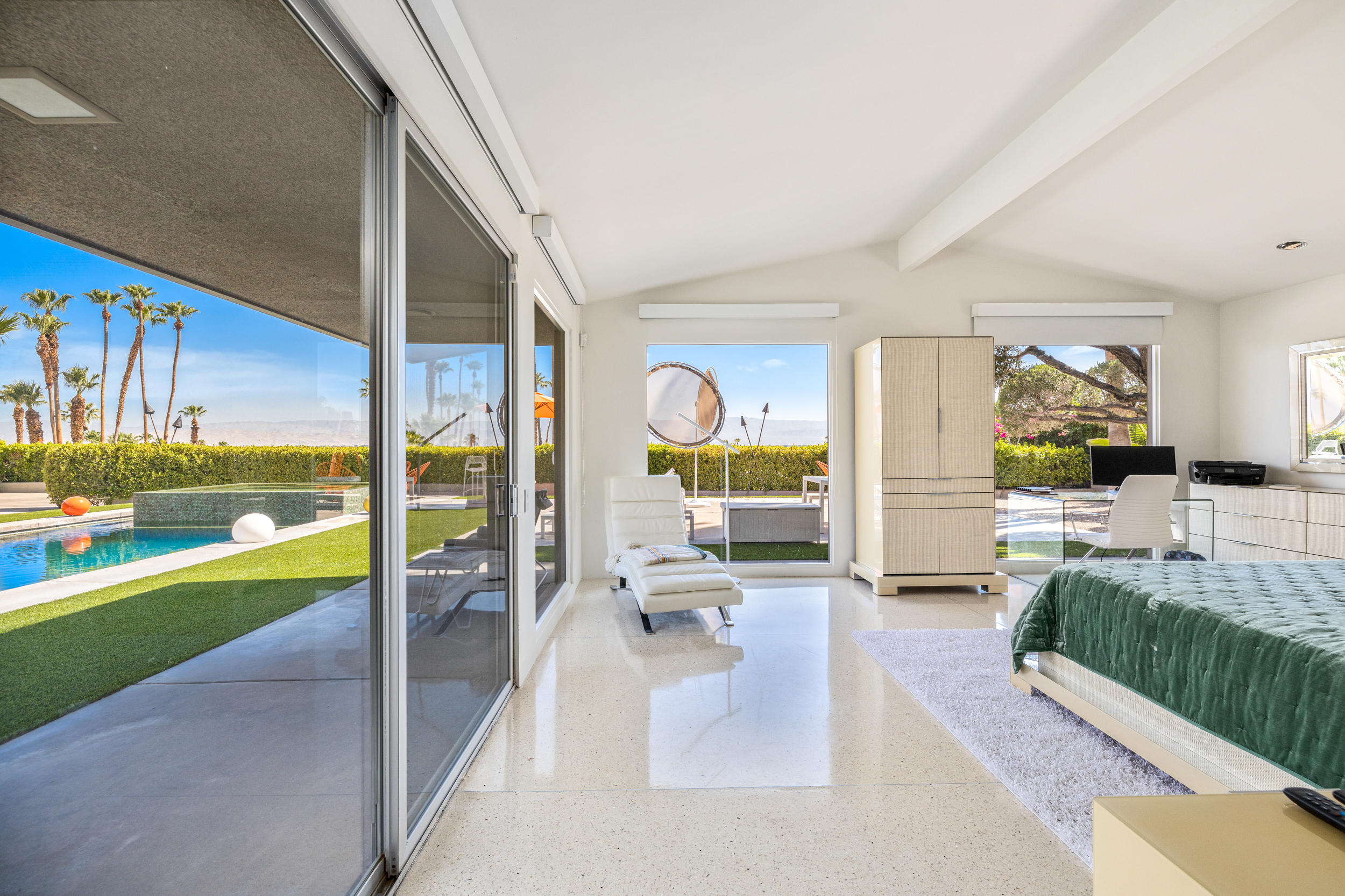 70411 Pecos Road Rancho Mirage, CA 92270 - Photo 15 of 44 a living room with furniture and a large window