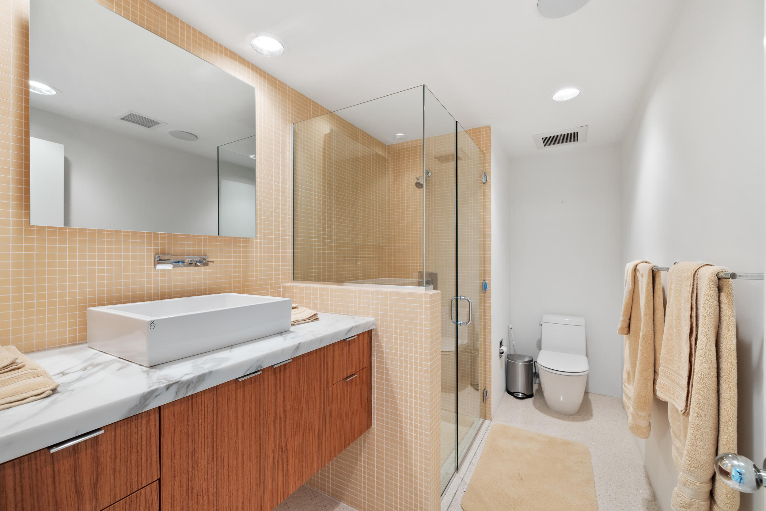 70411 Pecos Road Rancho Mirage, CA 92270 - Photo 23 of 44 a bathroom with a sink a toilet and shower