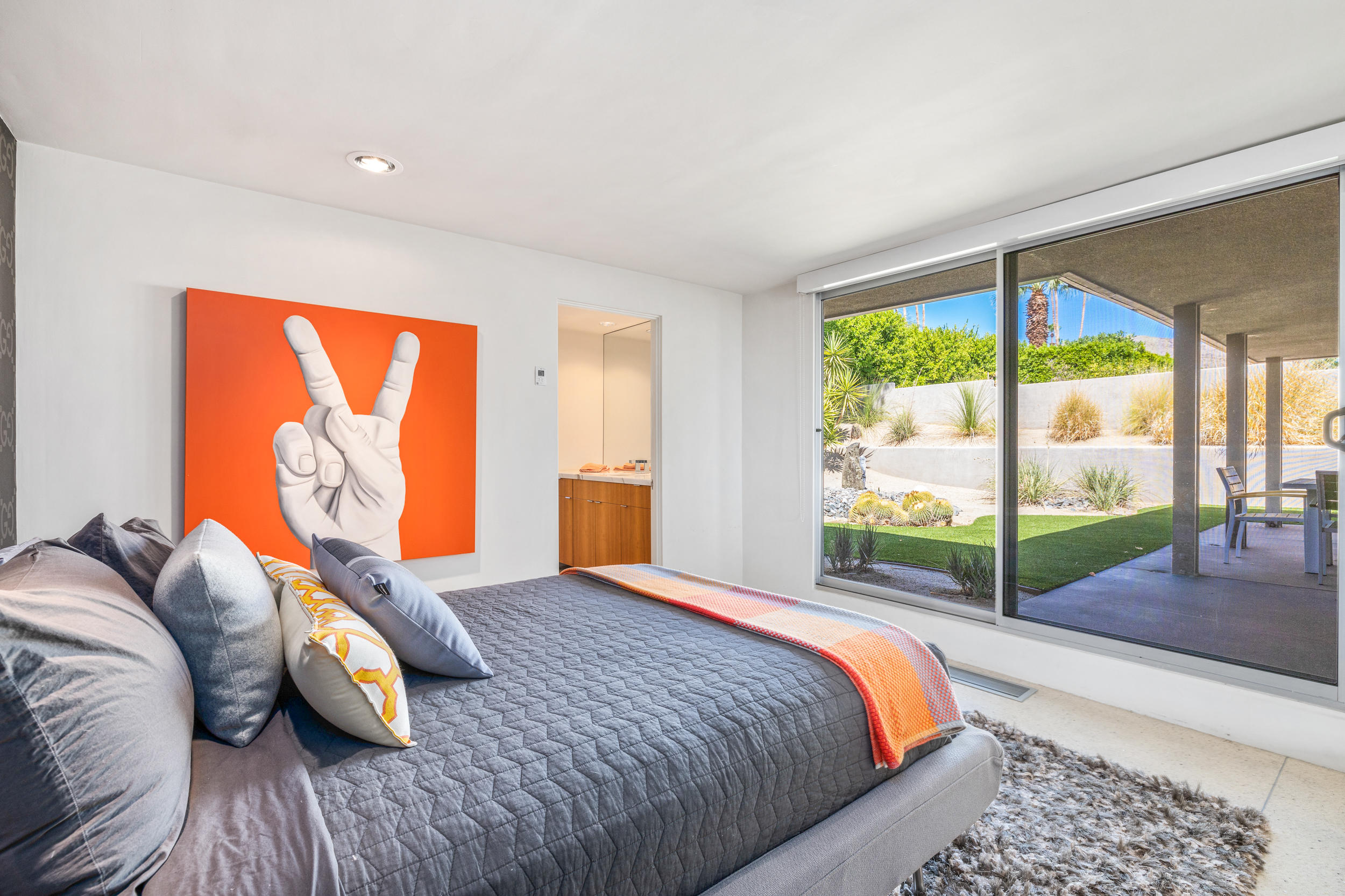 70411 Pecos Road Rancho Mirage, CA 92270 - Photo 25 of 44 a bed sitting in a bedroom next to a window