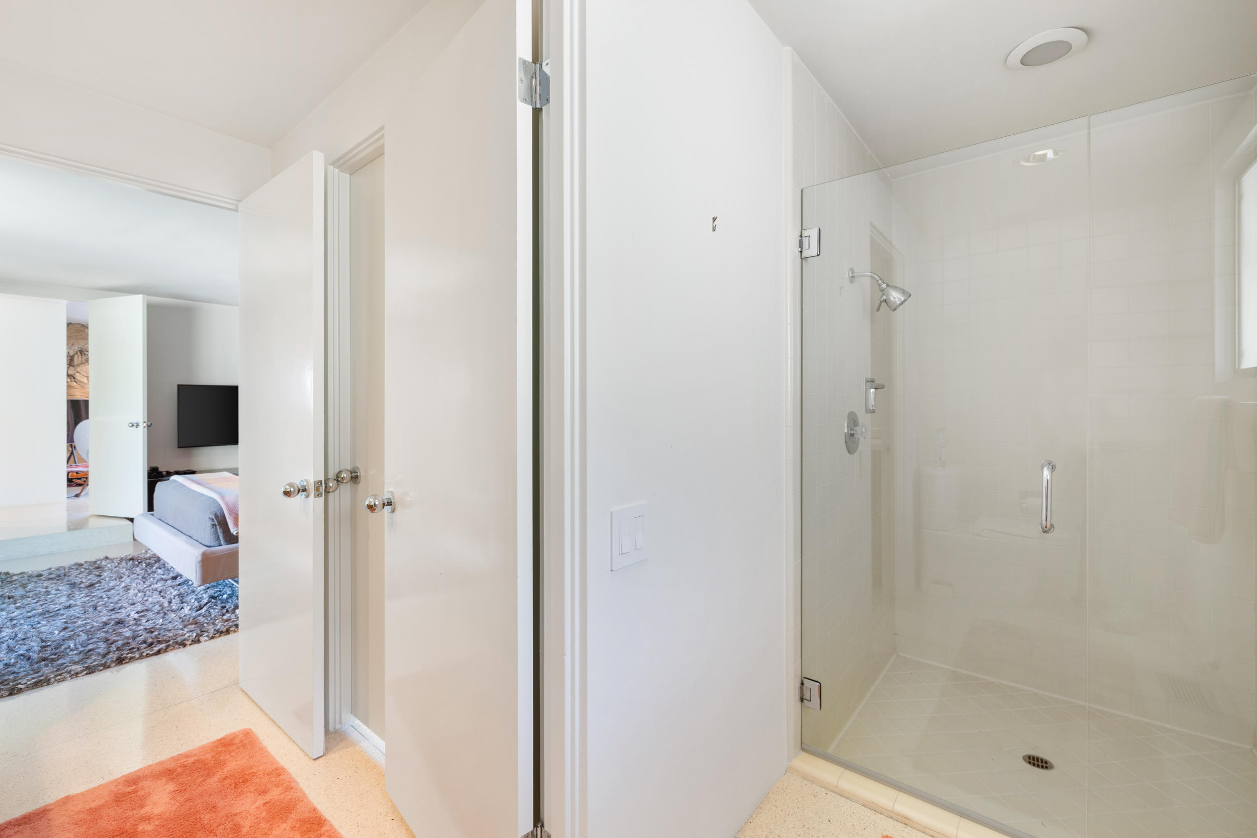 70411 Pecos Road Rancho Mirage, CA 92270 - Photo 27 of 44 a bathroom with a granite countertop sink and shower