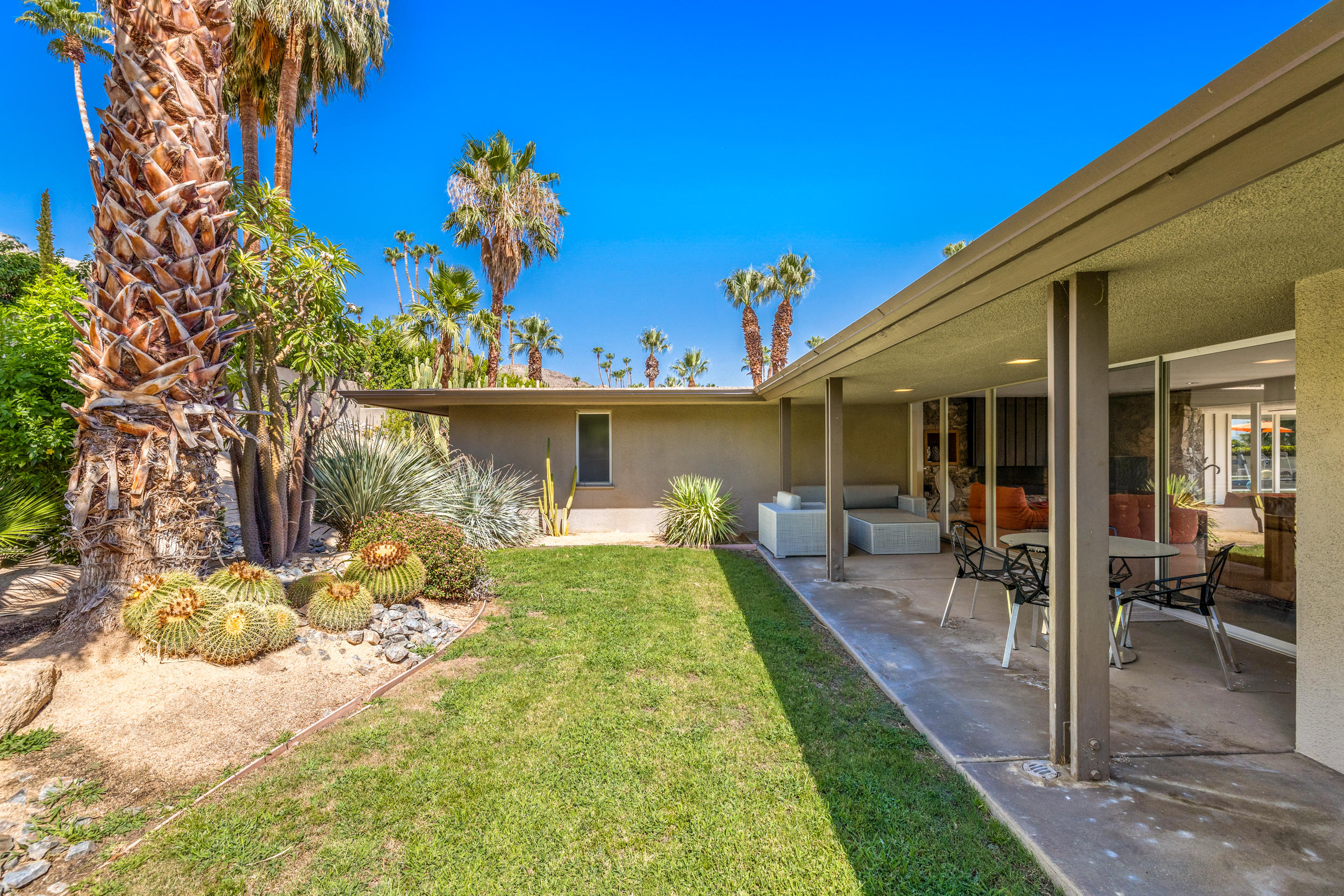 70411 Pecos Road Rancho Mirage, CA 92270 - Photo 40 of 44 a front view of a house with garden