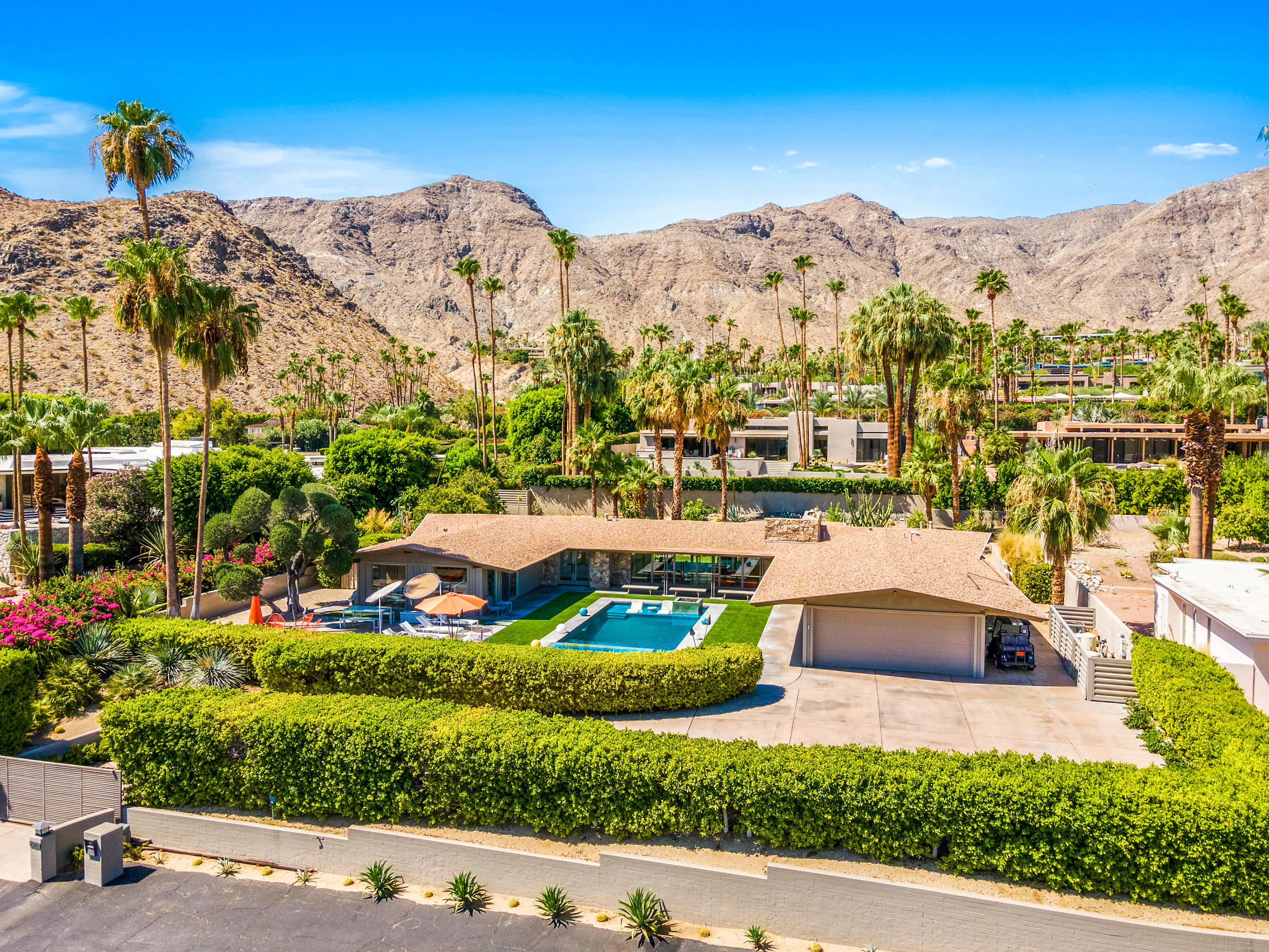 70411 Pecos Road Rancho Mirage, CA 92270 - Photo 42 of 44 a view of a terrace with a garden and mountain view