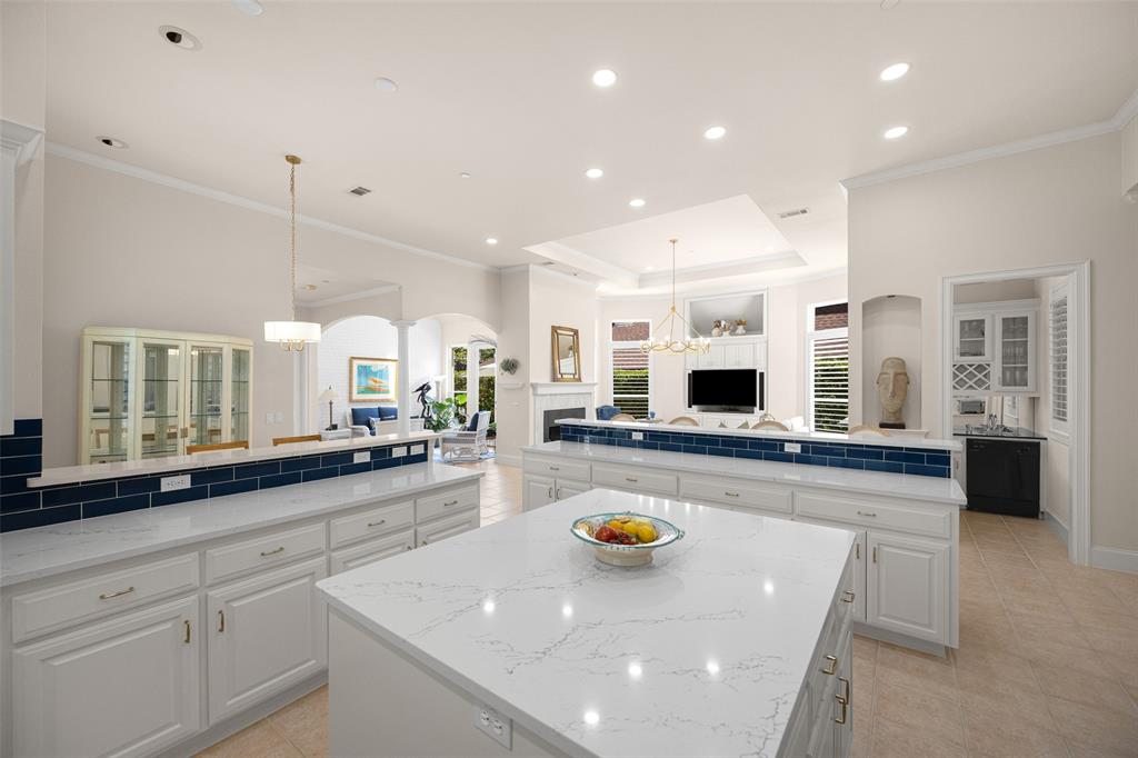 14725 Celestial Place Addison, TX 75254 - Photo 4 of 31 a kitchen with sink and view of living room