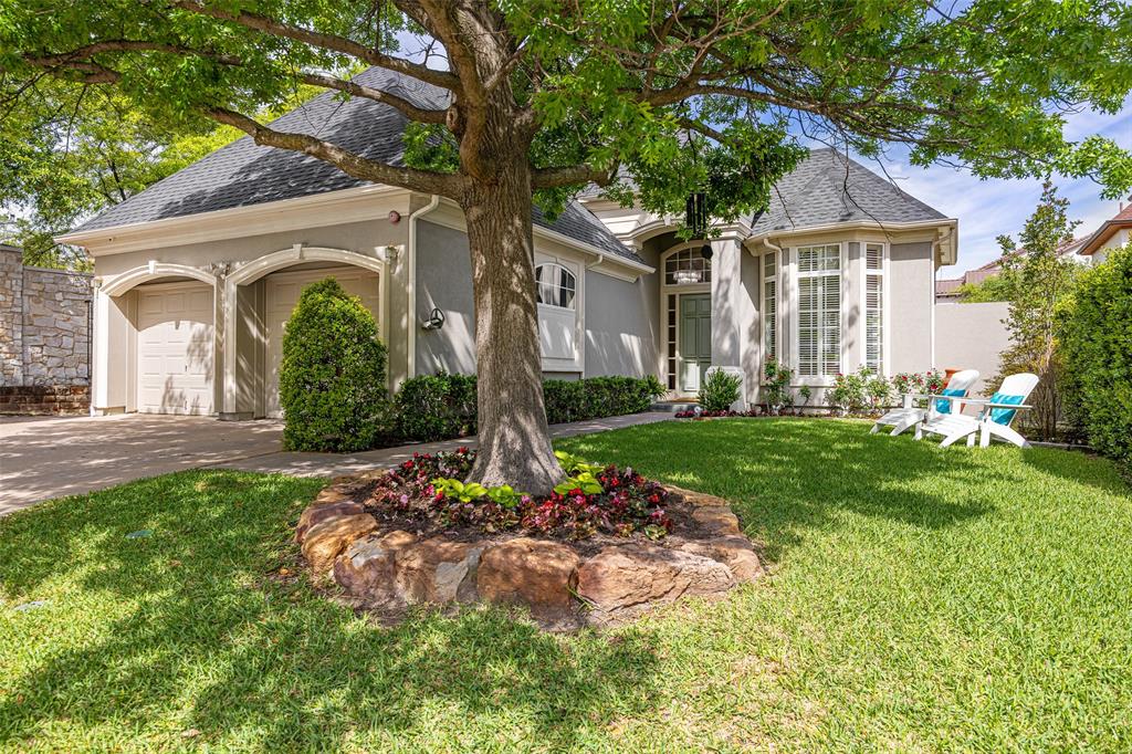 14725 Celestial Place Addison, TX 75254 - Photo 10 of 31 a front view of a house with garden