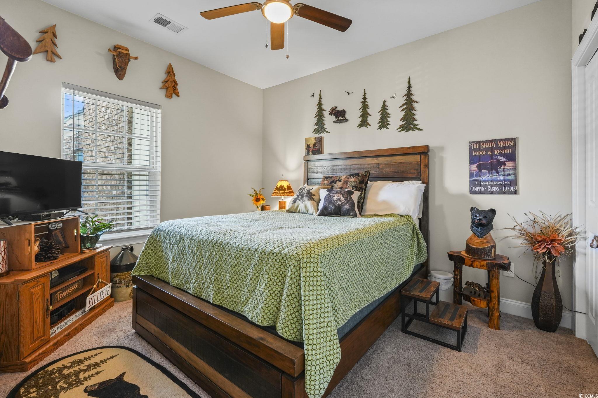 124 Birch N Coppice Drive, Unit 3 Surfside Beach, SC 29575 - Photo 23 of 40 Bedroom with carpet flooring and a ceiling fan