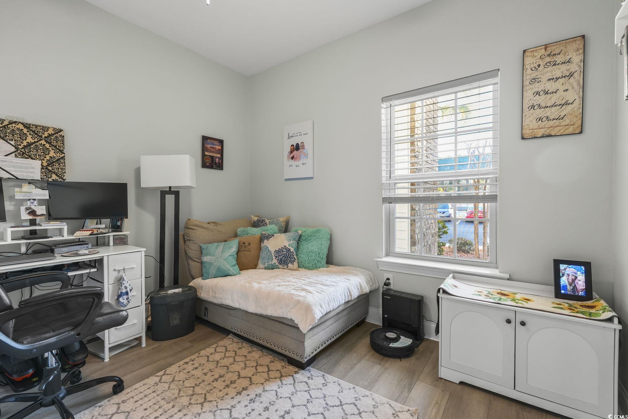 124 Birch N Coppice Drive, Unit 3 Surfside Beach, SC 29575 - Photo 25 of 40 Bedroom with light wood-style floors and a desk