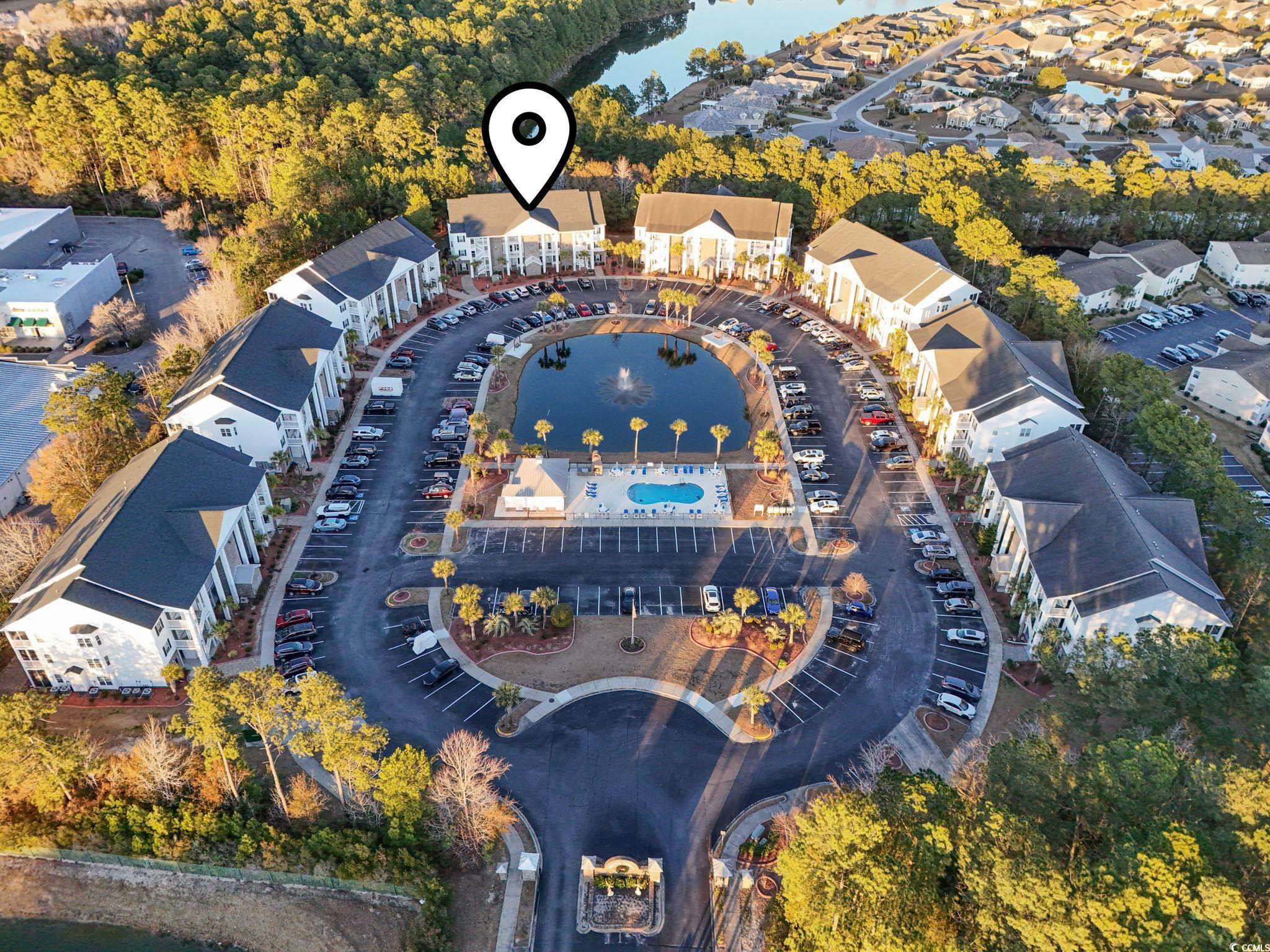 124 Birch N Coppice Drive, Unit 3 Surfside Beach, SC 29575 - Photo 3 of 40 Aerial view of property's location featuring a nearby body of water
