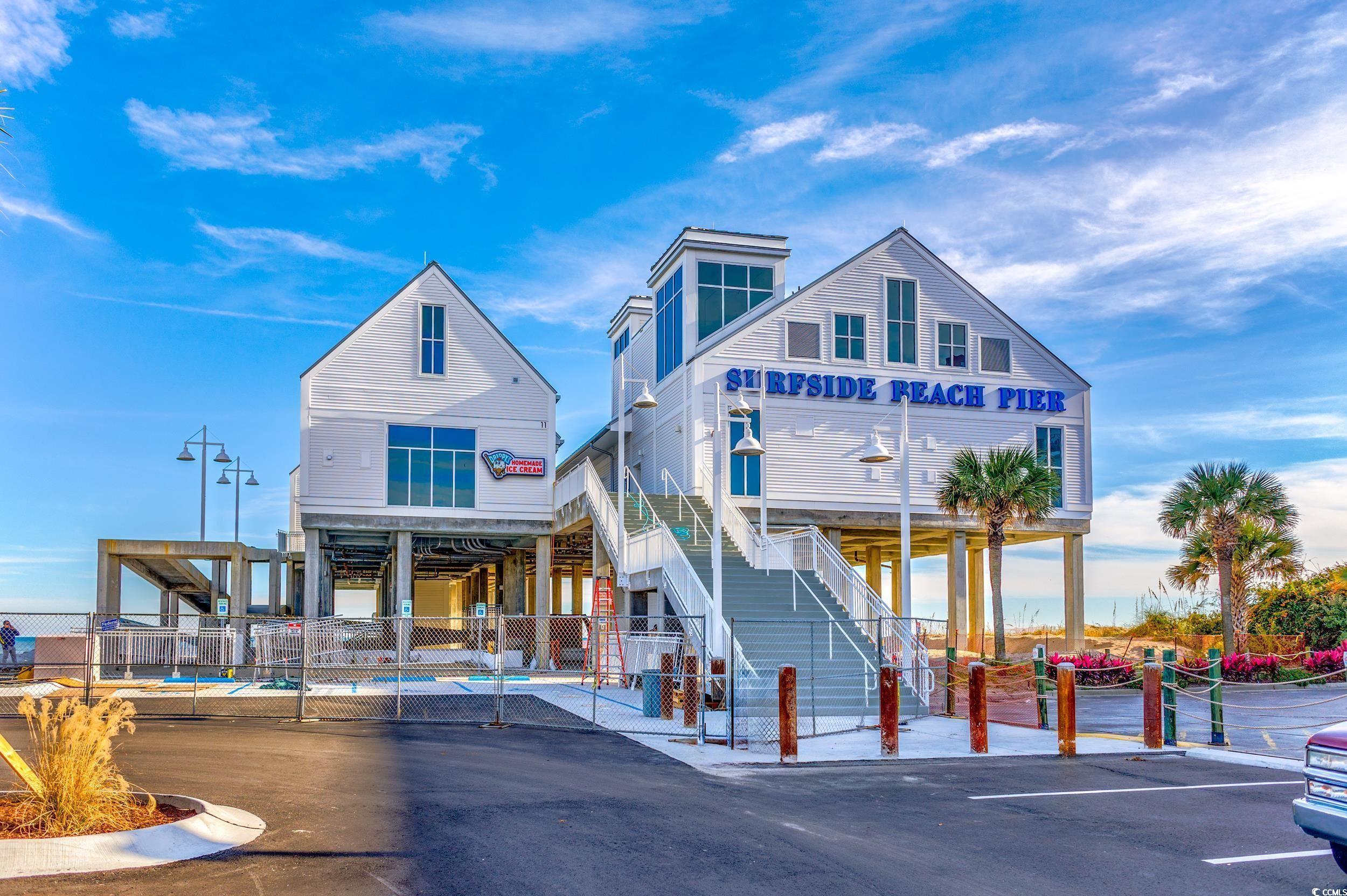 124 Birch N Coppice Drive, Unit 3 Surfside Beach, SC 29575 - Photo 33 of 40 View of building exterior featuring stairs