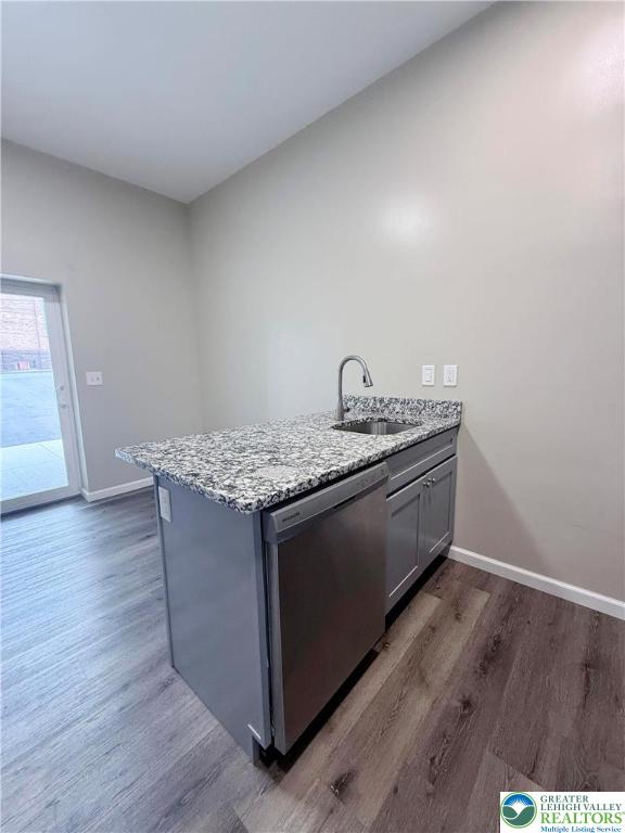 801 West Broad Street, Unit 1 Bethlehem, PA 18018 - Photo 15 of 31 a utility room with a sink a stove and wooden floor