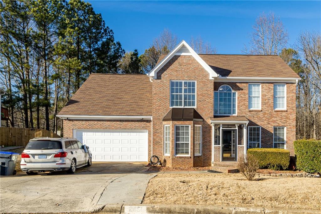 2851 Weston Brook Court Duluth, GA 30096 - Photo 1 of 1 a front view of a house with a yard