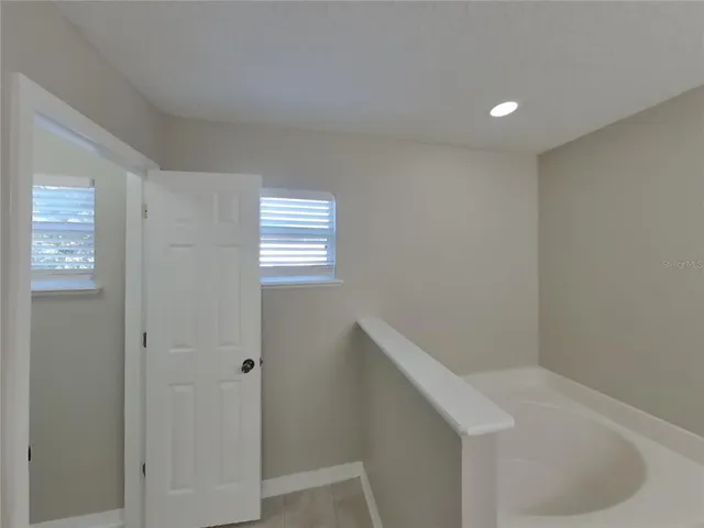 a bathroom with a sink and vanity
