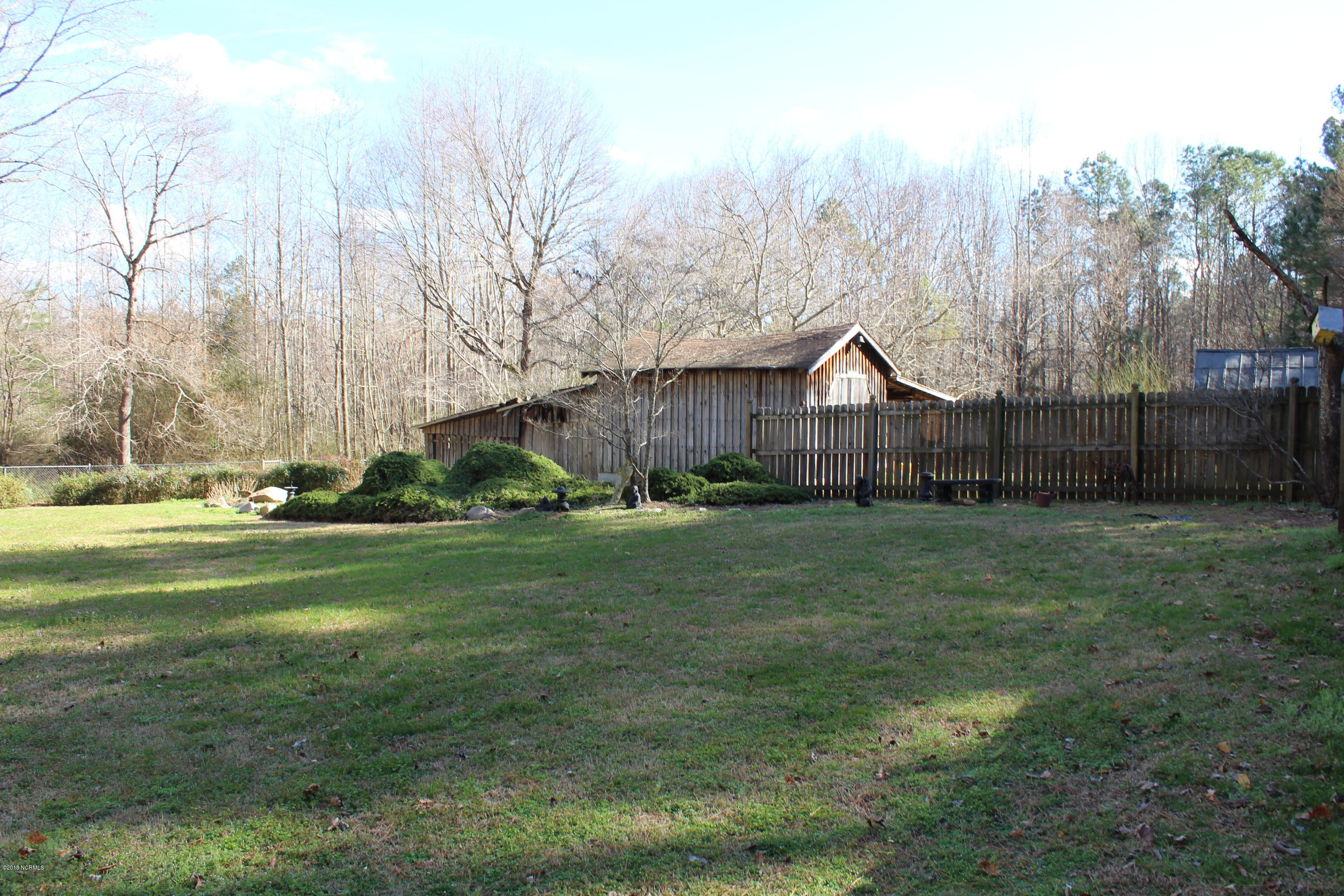 9785 Highway 64 Spring Hope, NC 27882 - Photo 15 of 15 Backyard view