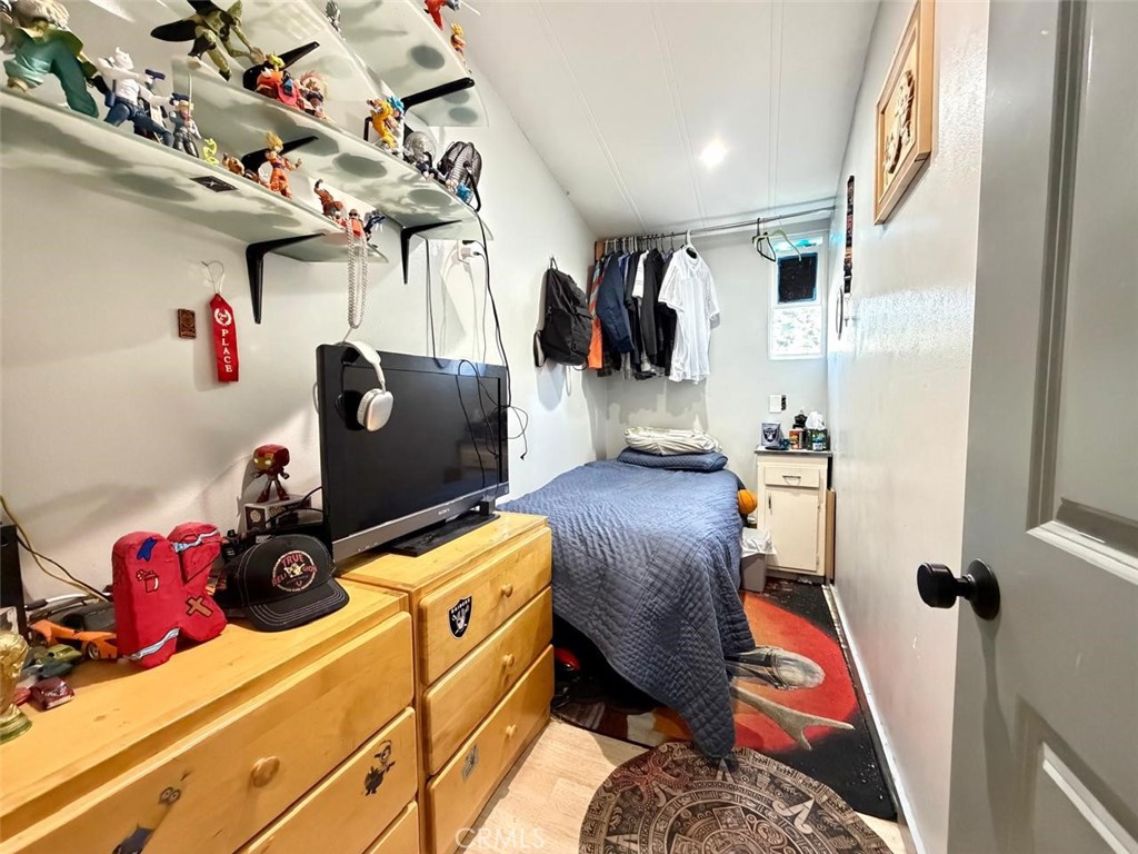 5700 Carbon Canyon Road, Unit 83 Brea, CA 92823 - Photo 11 of 24 a bed room with a bed and a couch