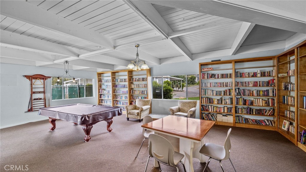 5700 Carbon Canyon Road, Unit 83 Brea, CA 92823 - Photo 21 of 24 a reading room with furniture and a large window