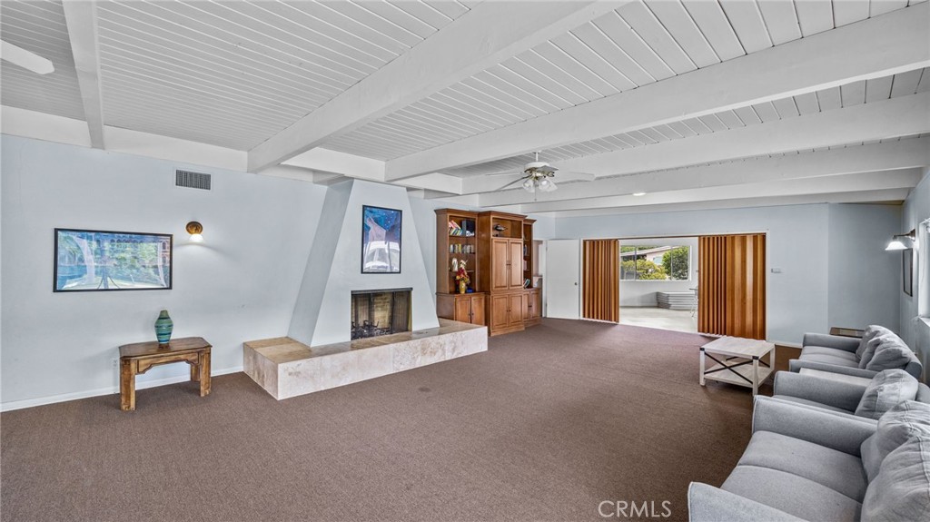 5700 Carbon Canyon Road, Unit 83 Brea, CA 92823 - Photo 22 of 24 a living room with furniture and a flat screen tv