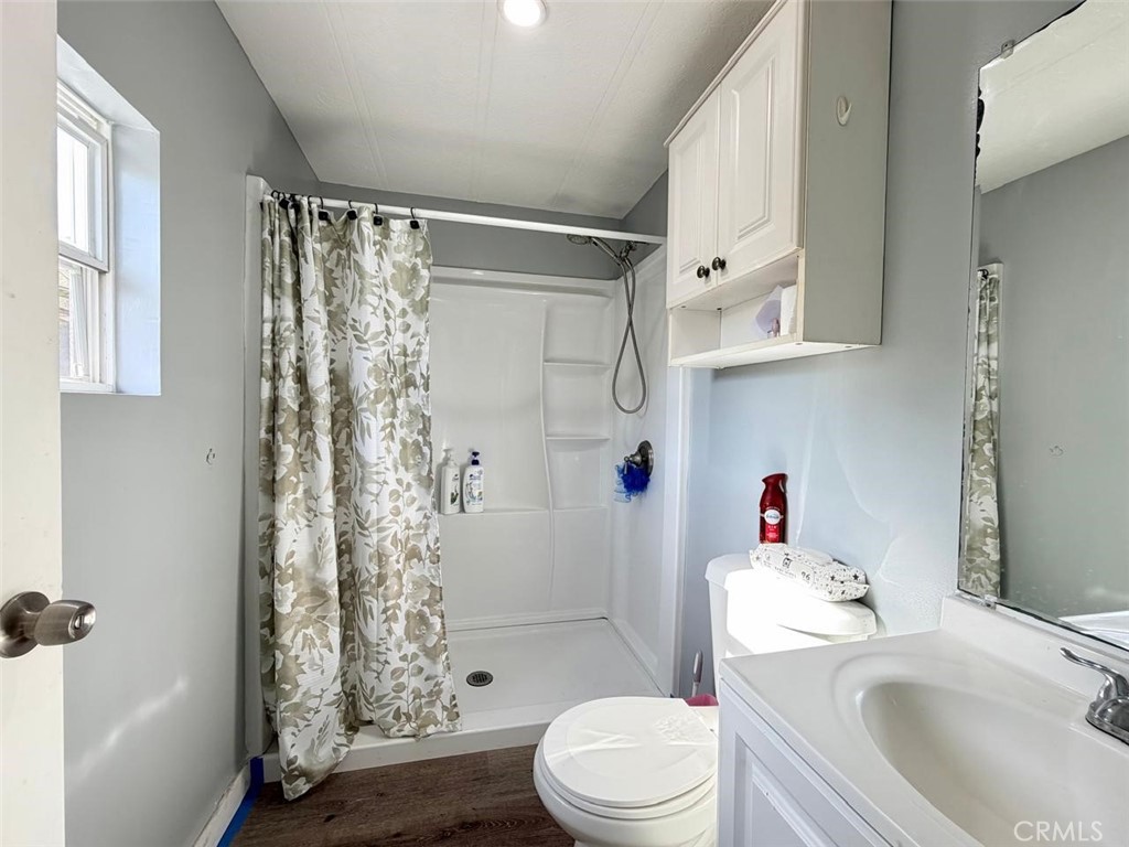 5700 Carbon Canyon Road, Unit 83 Brea, CA 92823 - Photo 8 of 24 a bathroom with a sink toilet and shower
