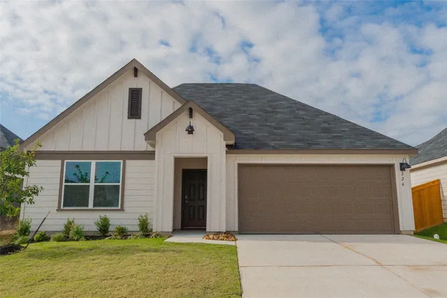 a front view of house with yard