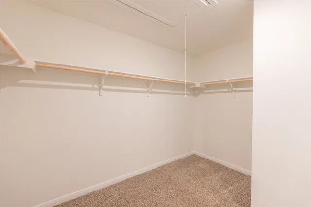 a view of a room with shelf on the wall