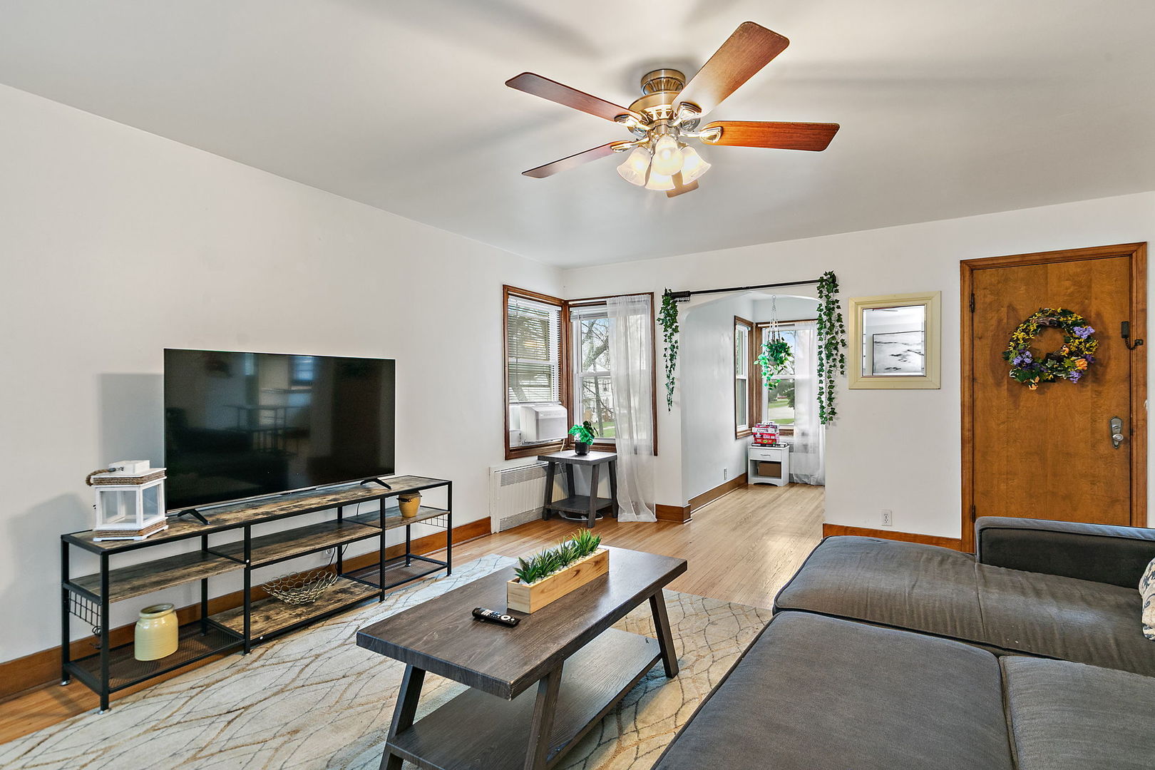 820 Lincoln Highway Rochelle, IL 61068 - Photo 5 of 27 a living room with furniture and a flat screen tv