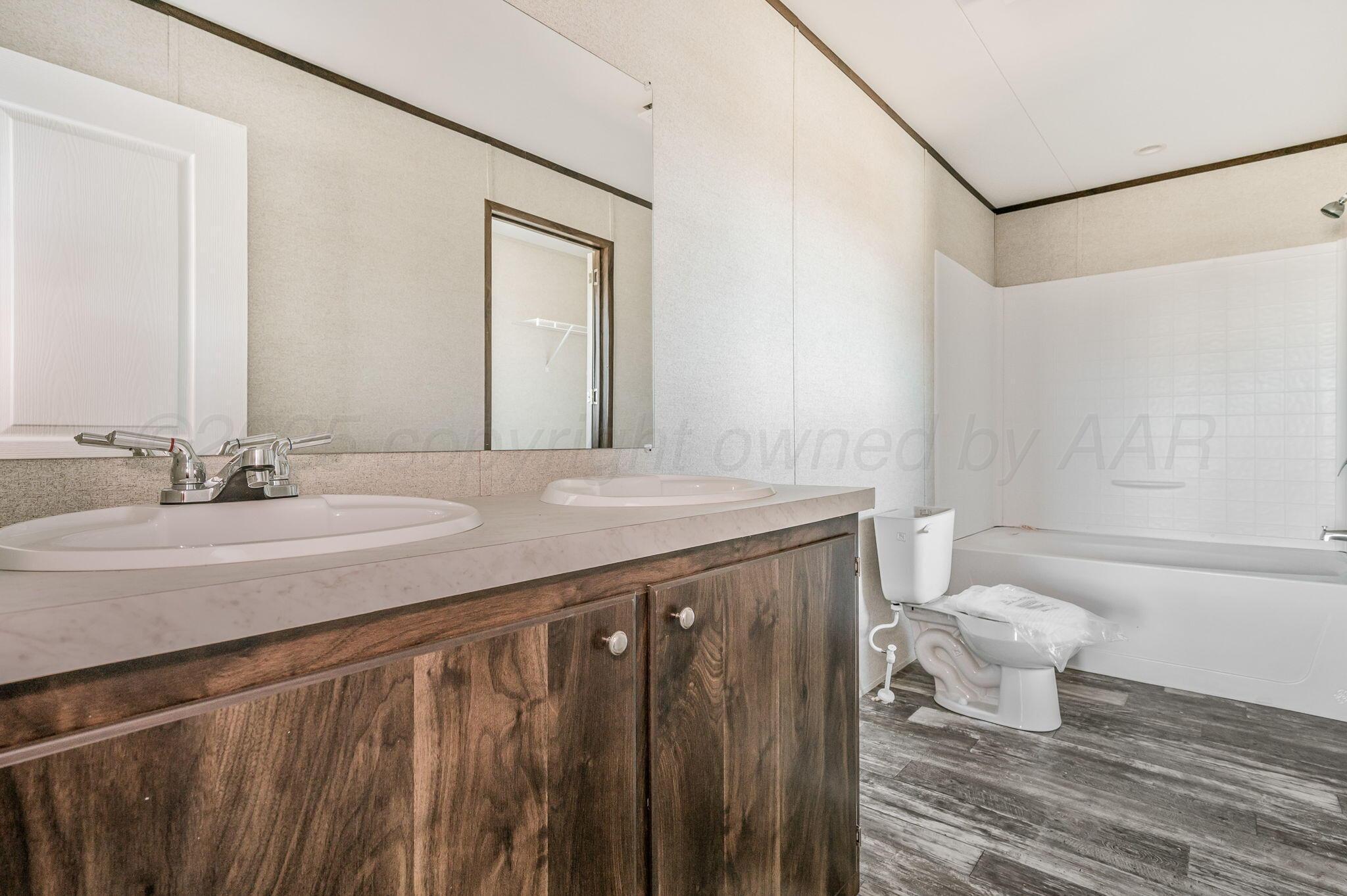 6300 Sawyer Road Amarillo, TX 79119 - Photo 10 of 16 Primary Bath