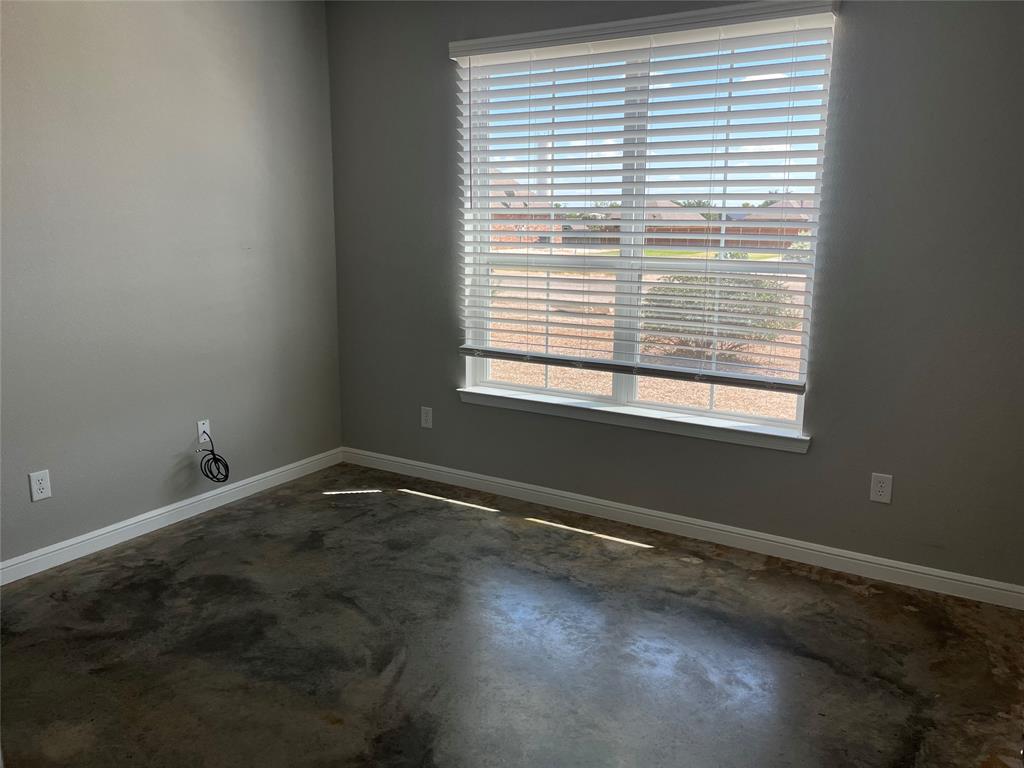 1043 Cr 327a Glen Glen Rose, TX 76043 - Photo 7 of 10 a view of an empty room with a window