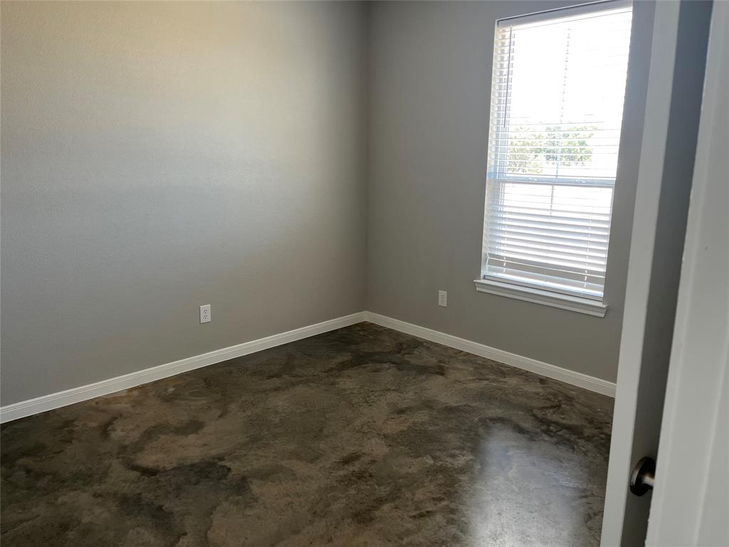 1043 Cr 327a Glen Glen Rose, TX 76043 - Photo 9 of 10 an empty room with a window