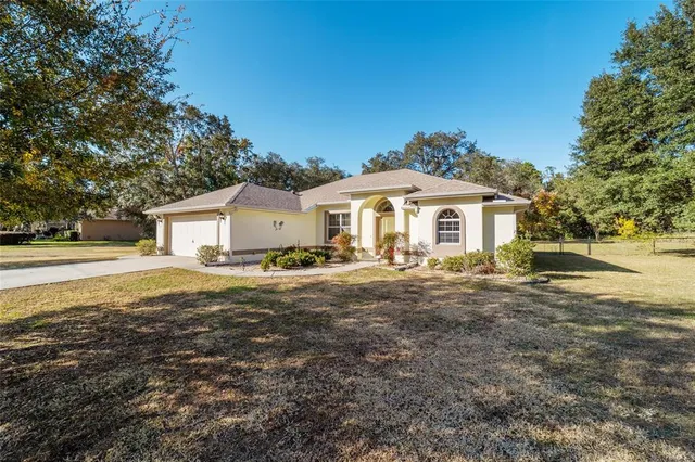 $425,000 | 2340 West Tall Oaks Drive, Beverly Hills, FL 34465