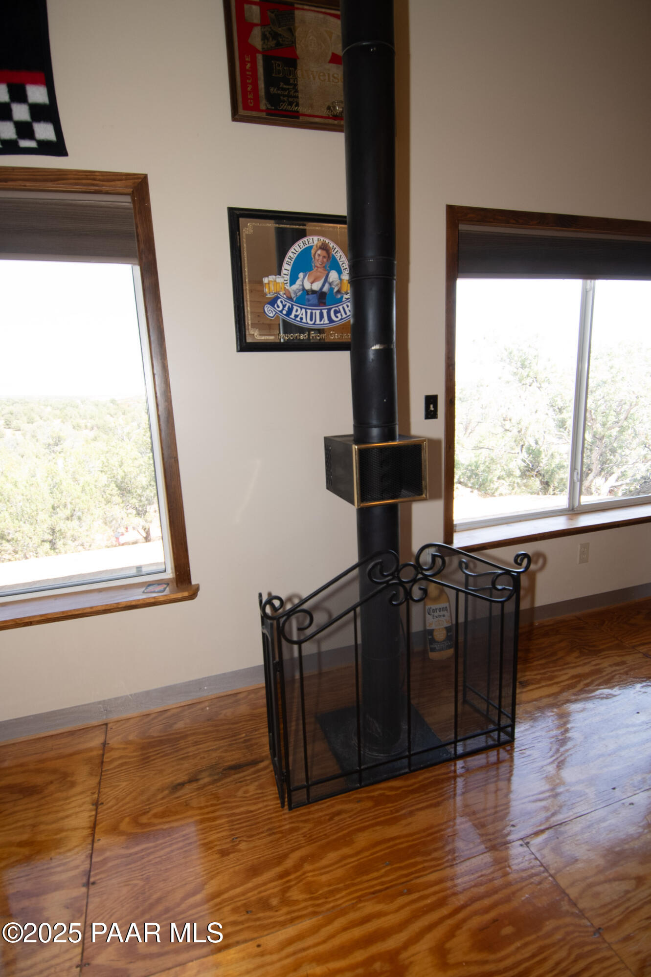 33744 Gallina Road Seligman, AZ 86337 - Photo 16 of 38 a view of a livingroom with furniture wooden floor and window