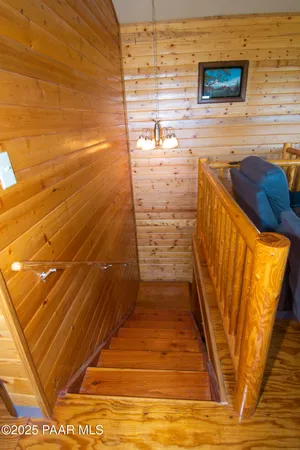 a view of a balcony with wooden floor