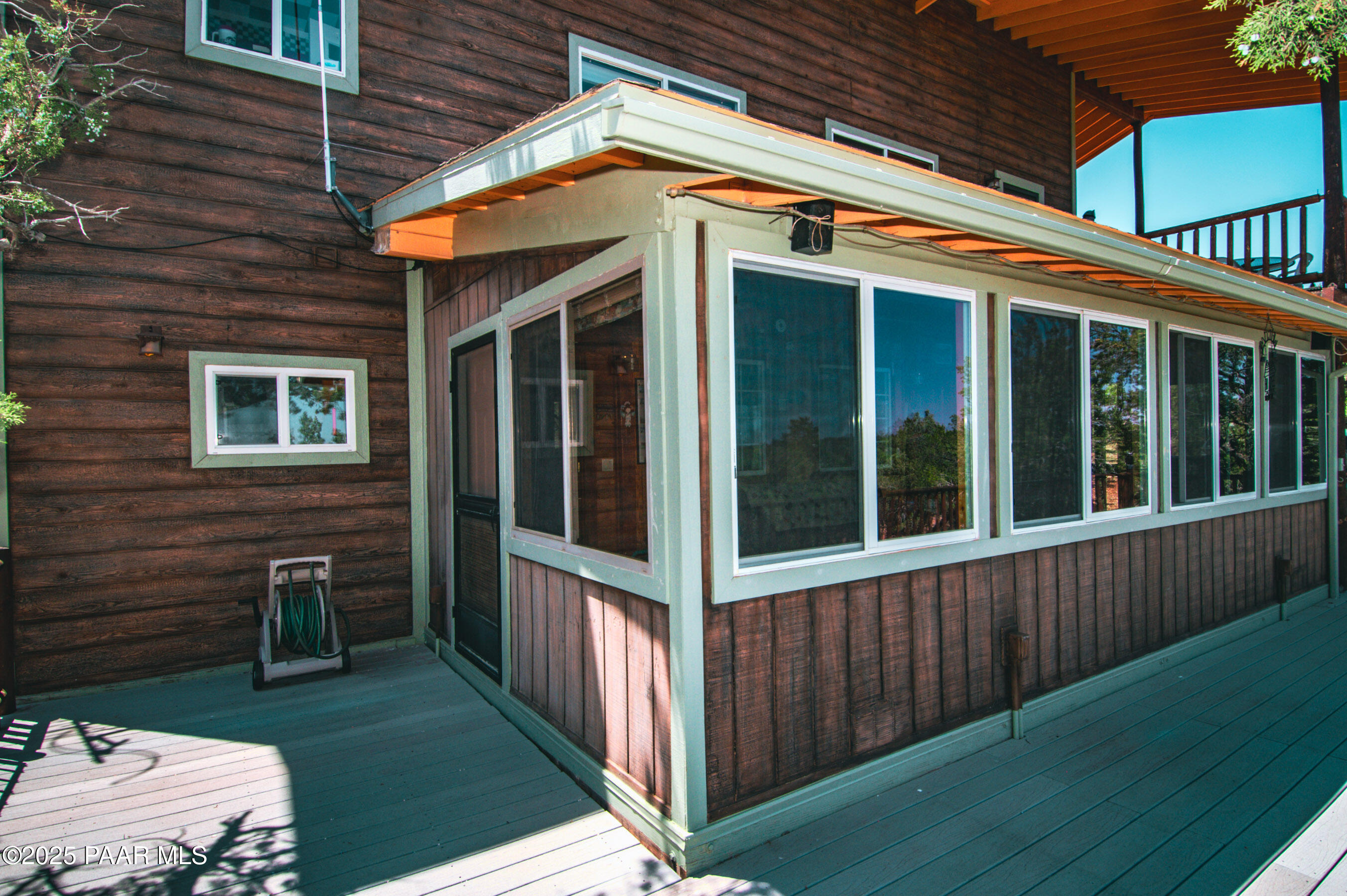 33744 Gallina Road Seligman, AZ 86337 - Photo 20 of 38 a view of a house with wooden floor and a yard