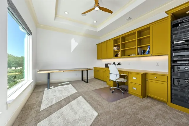 a view of interior space with wooden floor and windows