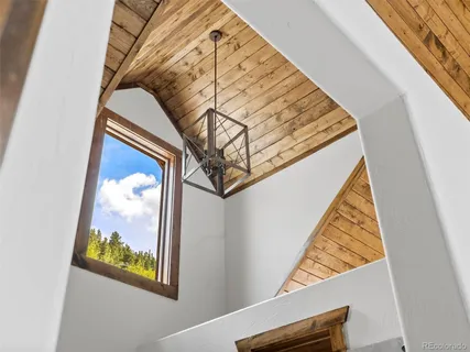 a bathroom with a tub and shower