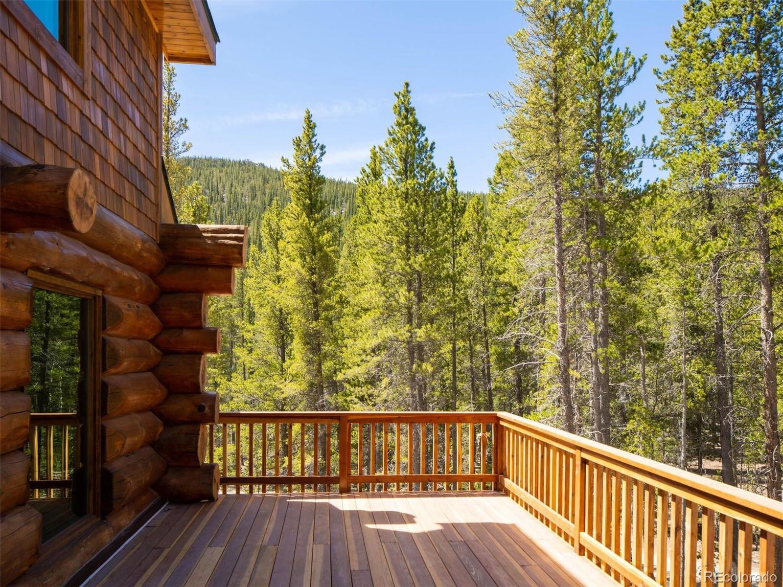 733 Rainbow Road Idaho Springs, CO 80452 - Photo 9 of 47 a view of balcony with wooden floor