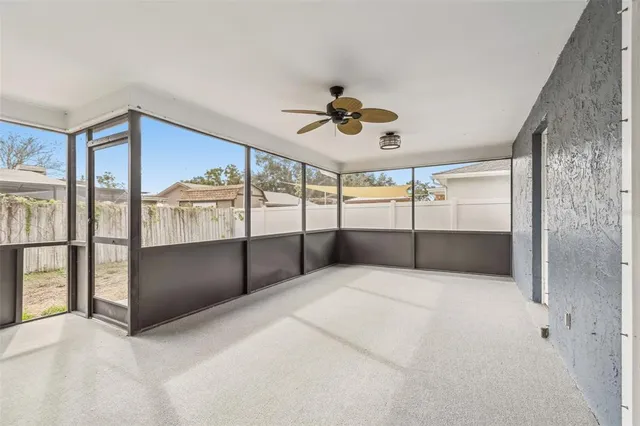 a view of a livingroom with a ceiling fan