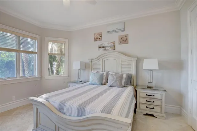 a view of entryway and hall with a wooden floor
