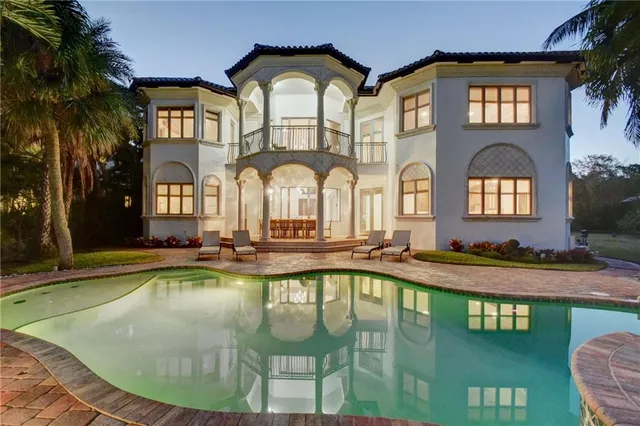 a view of hall way with furniture