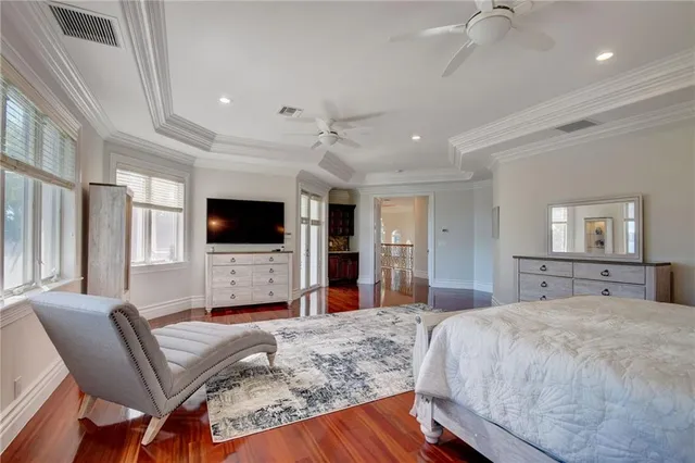 a bedroom with furniture and window