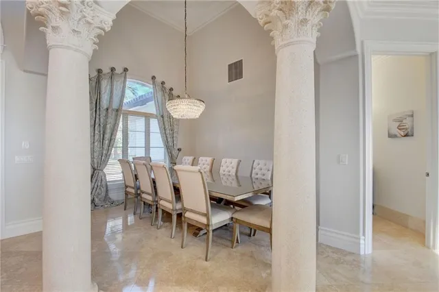 a view of a dining room with furniture