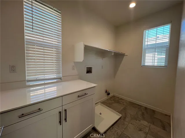 a room with storage and window