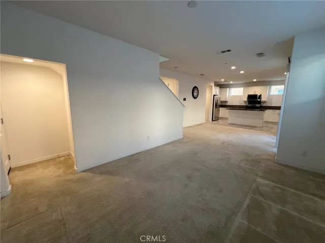 a view of a kitchen and a window