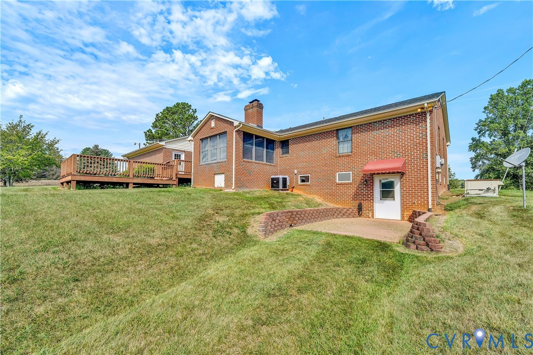 258 Willow Oak Road Appomattox, VA 24522 - Photo 46 of 50 Brick exterior featuring a wood-deck, a screened-i