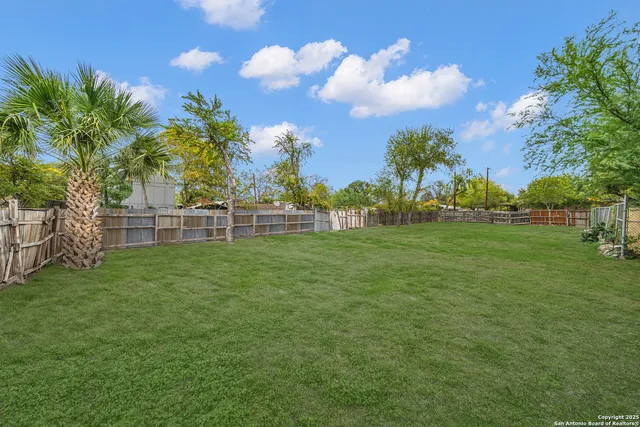 a view of a golf course with a lake