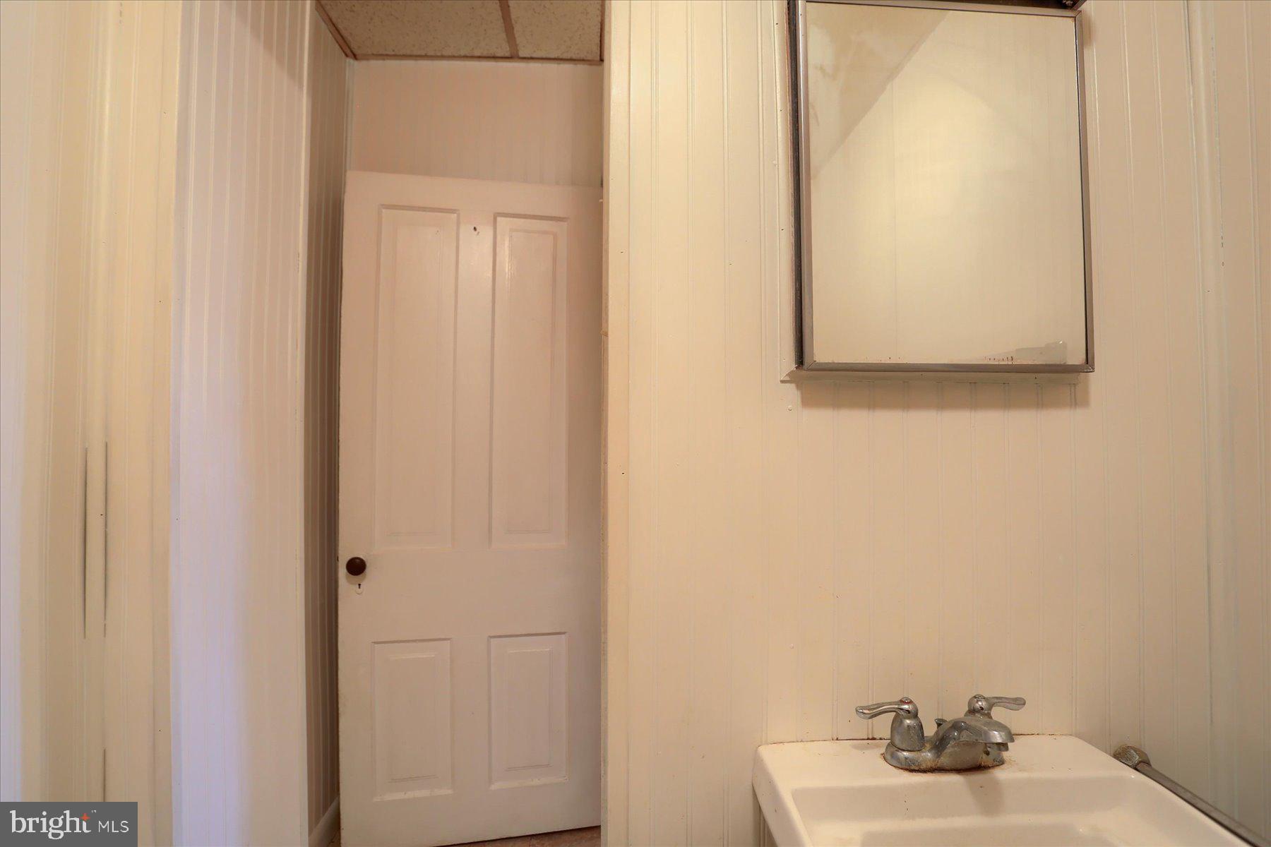 283 North Locust Point Road Mechanicsburg, PA 17050 - Photo 12 of 33 a bathroom with a sink and a mirror