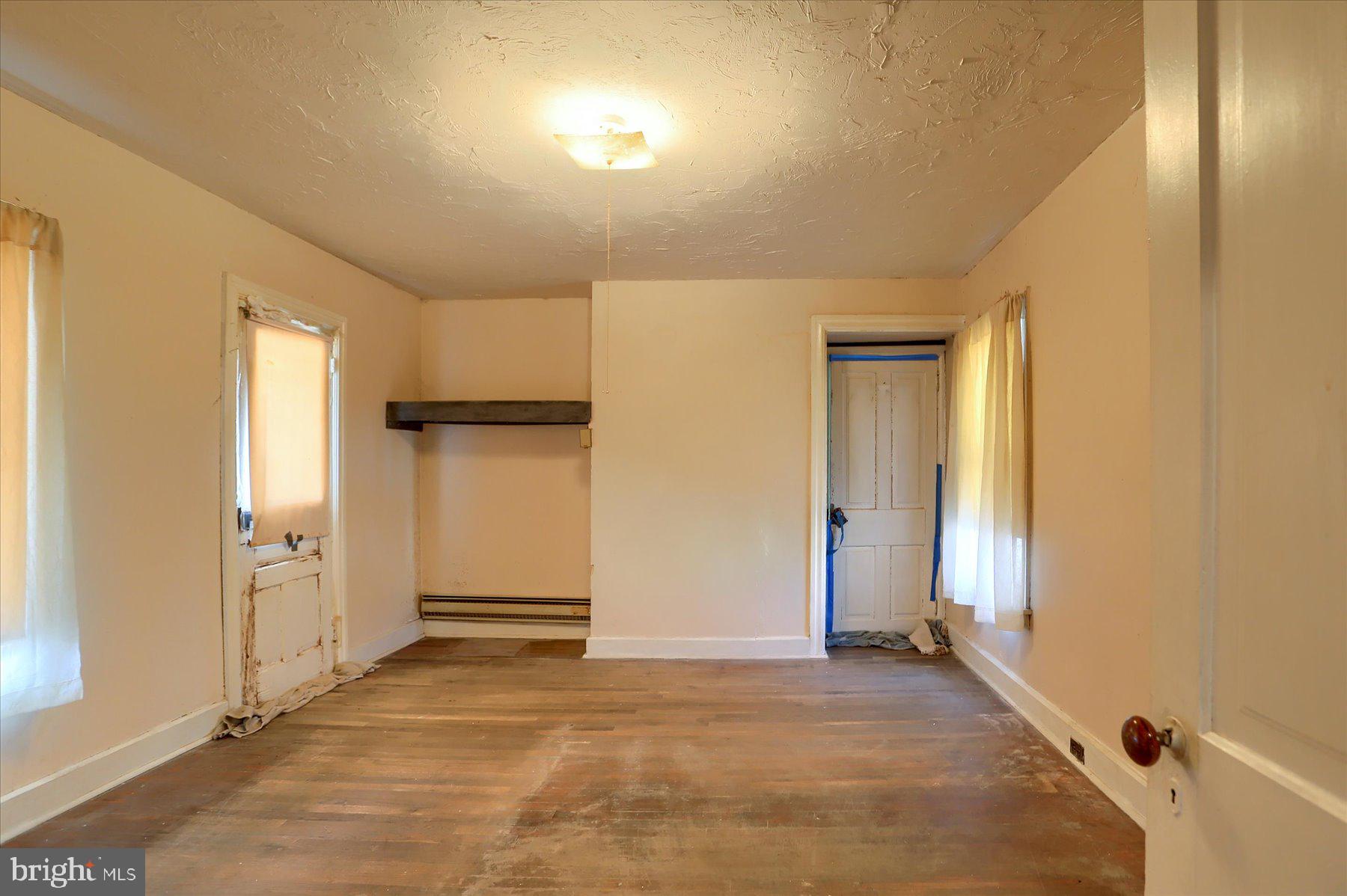 283 North Locust Point Road Mechanicsburg, PA 17050 - Photo 17 of 33 an empty room with closet and windows