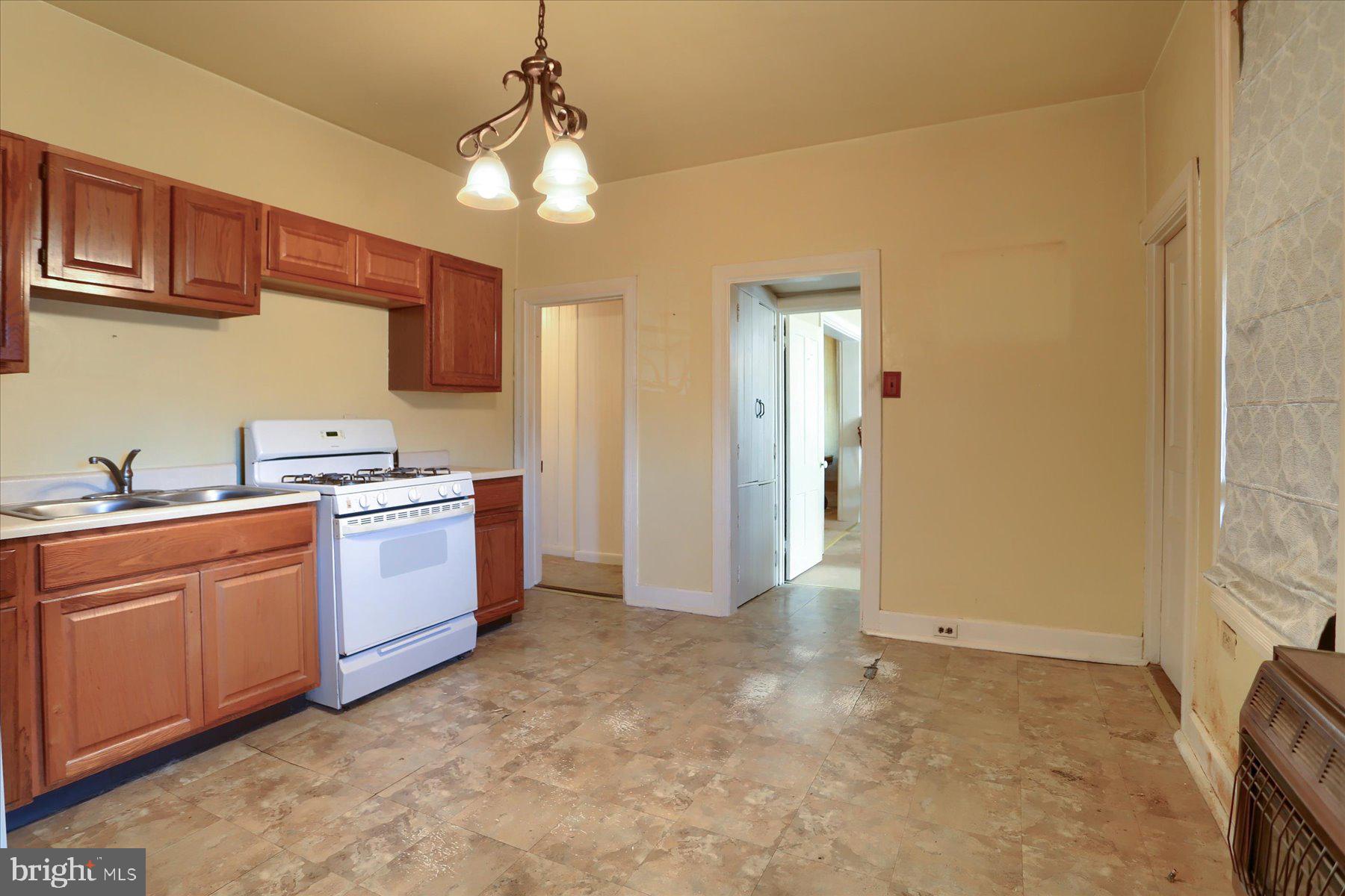 283 North Locust Point Road Mechanicsburg, PA 17050 - Photo 2 of 33 a view of a kitchen with a sink and cabinets
