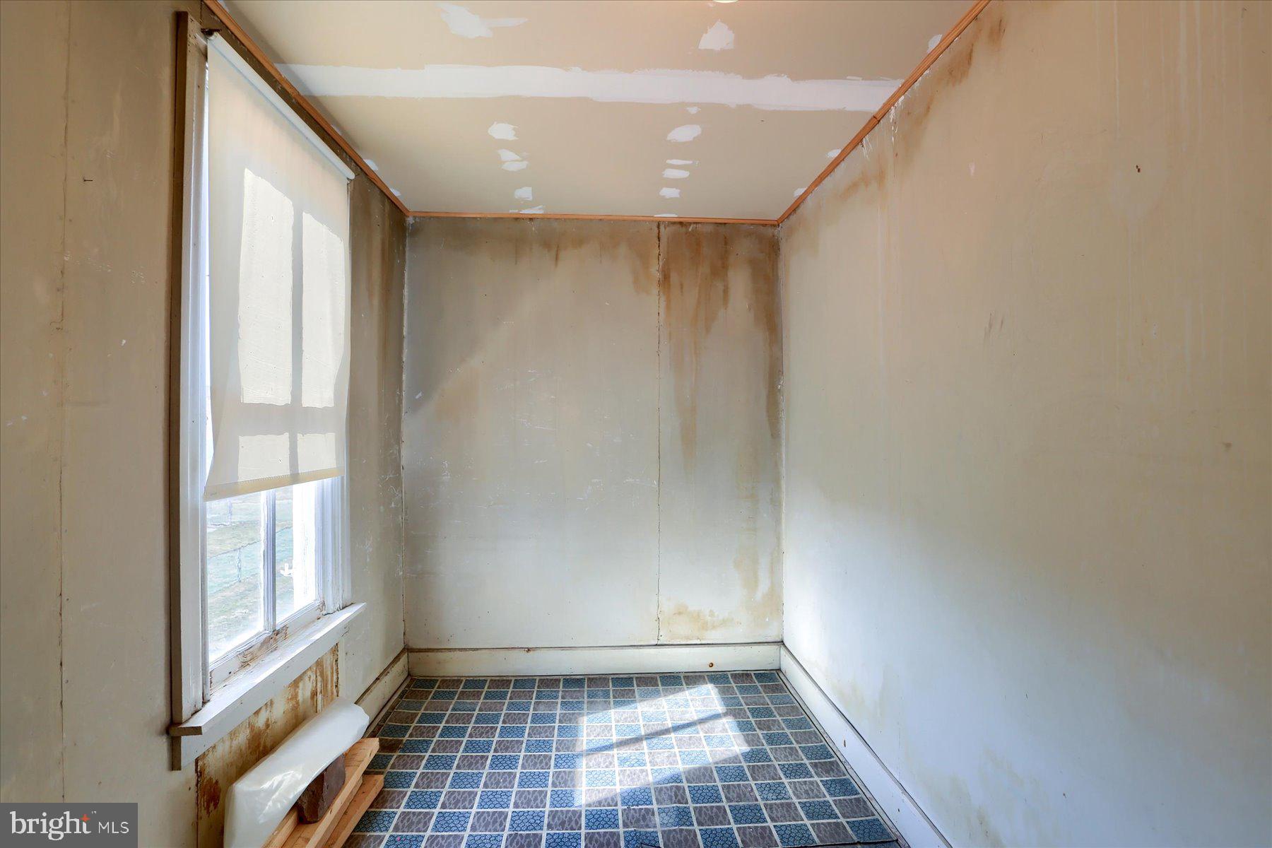 283 North Locust Point Road Mechanicsburg, PA 17050 - Photo 21 of 33 a view of an empty room with a window