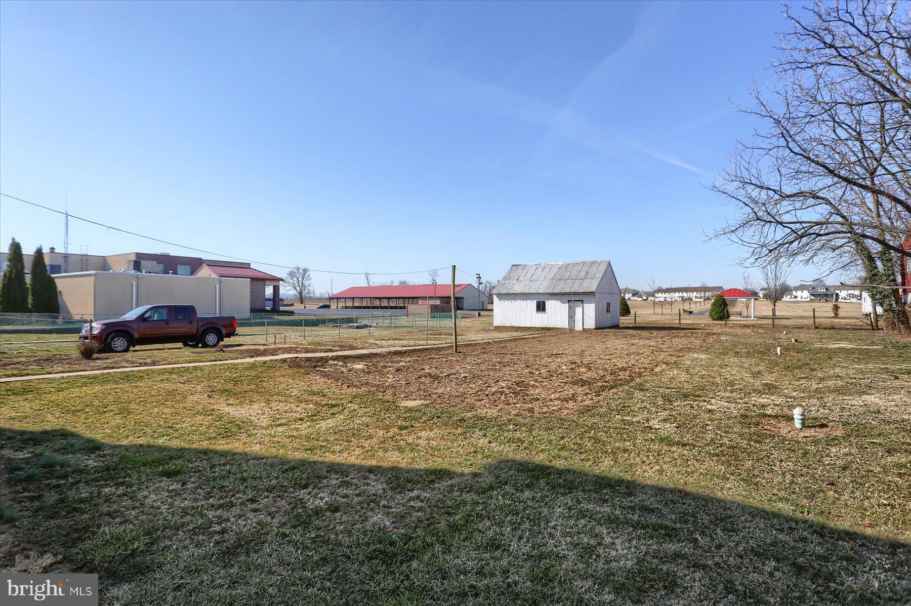 283 North Locust Point Road Mechanicsburg, PA 17050 - Photo 30 of 33 a swimming pool with outdoor seating and yard