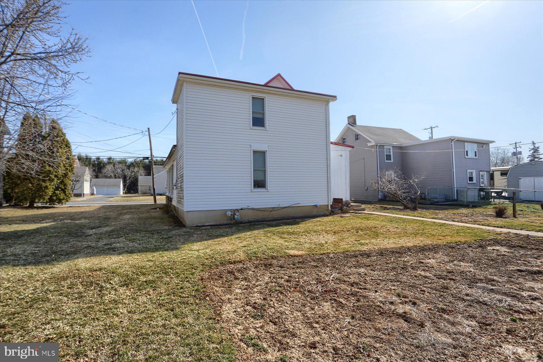 283 North Locust Point Road Mechanicsburg, PA 17050 - Photo 31 of 33 a view of a house with a yard