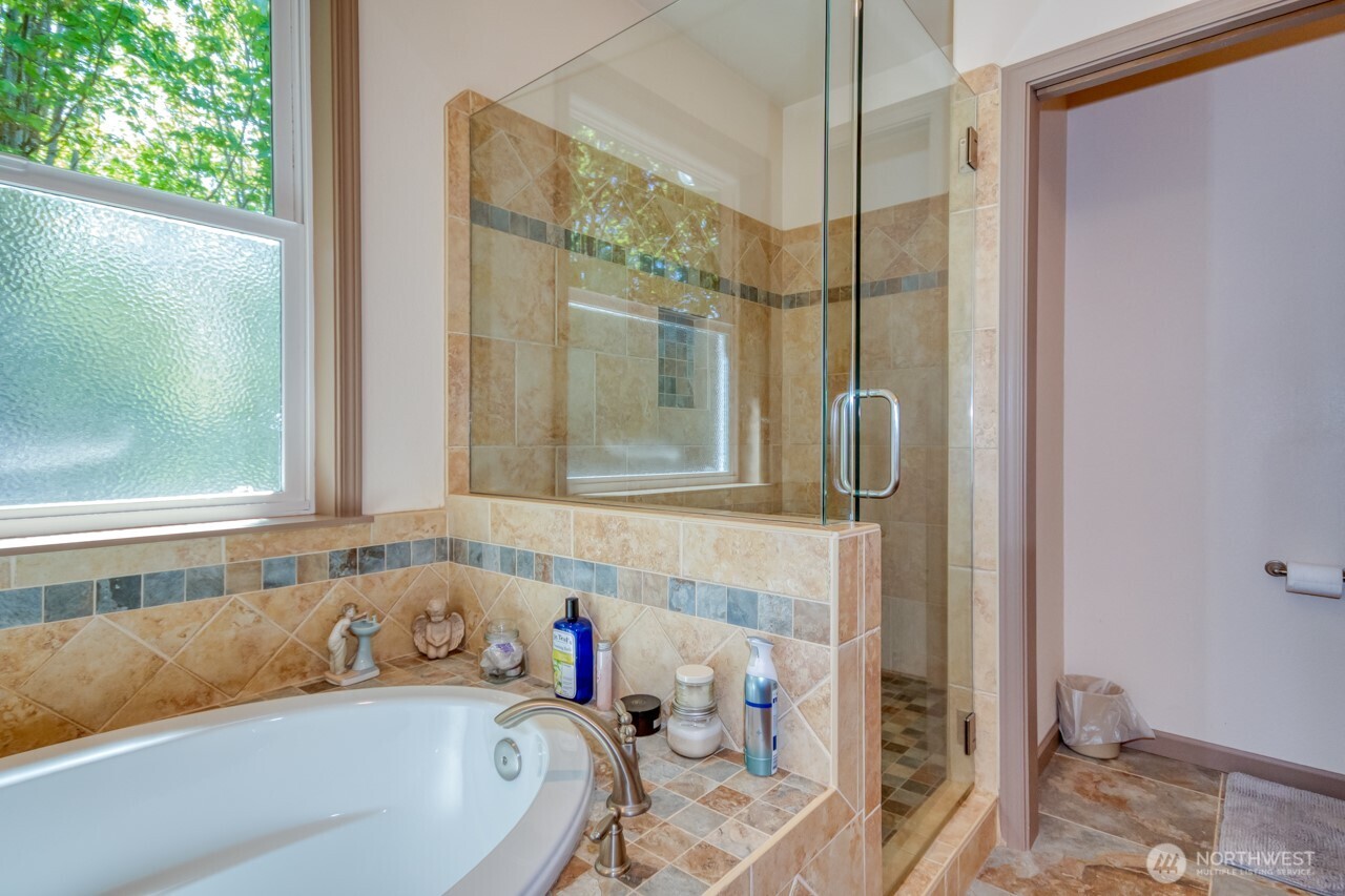 163 Prawn Road Port Angeles, WA 98363 - Photo 18 of 40 a bathroom with a tub and shower