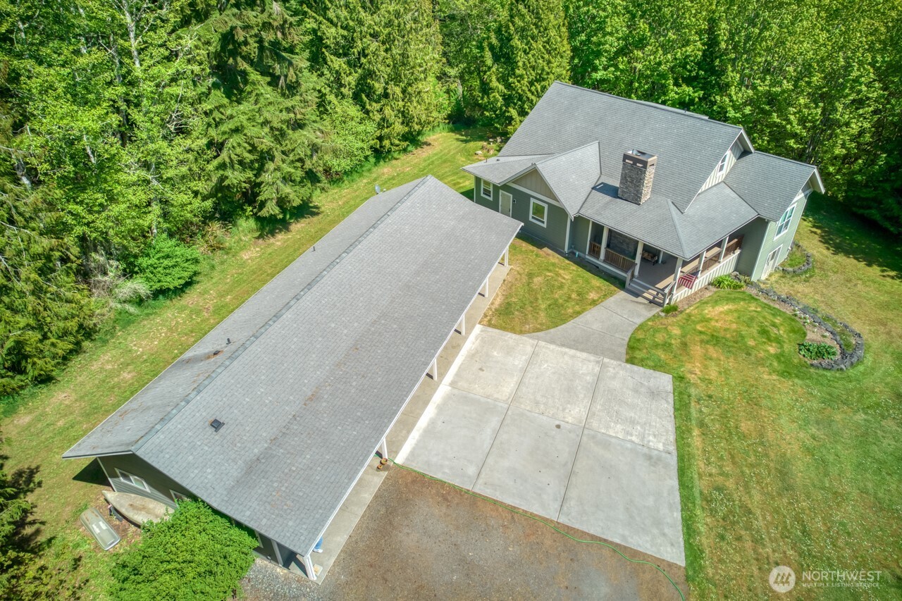 163 Prawn Road Port Angeles, WA 98363 - Photo 3 of 40 an aerial view of a house with outdoor space